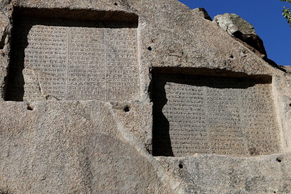 The trilingual text in close view.