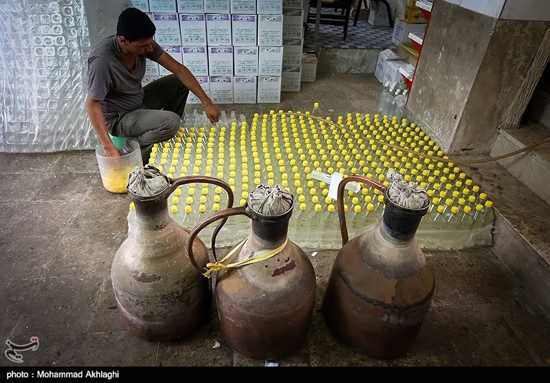Making rose water in Qamsar.