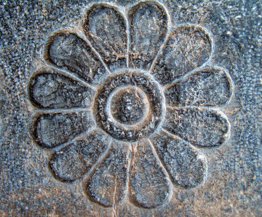 A lotus rosette carved in stone.